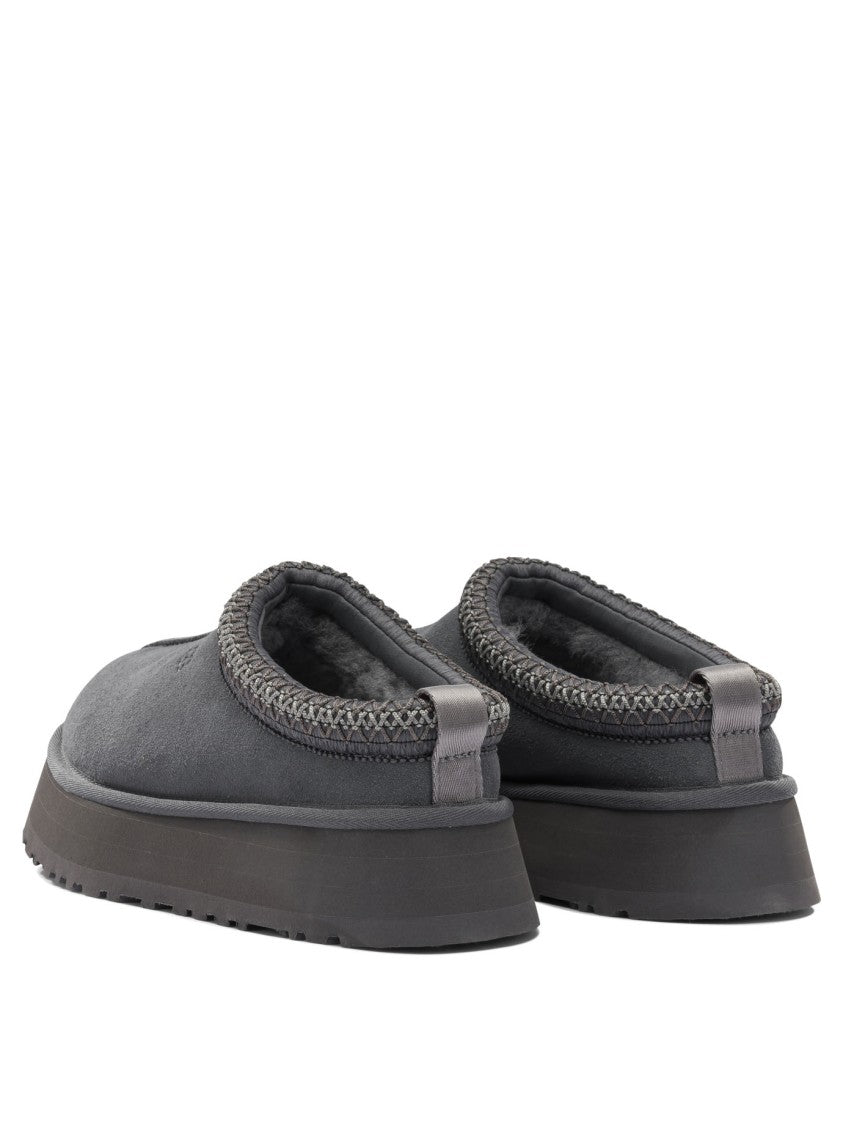 Ugg Black Slip-On Loafers With Braided Trim And Textured Sole