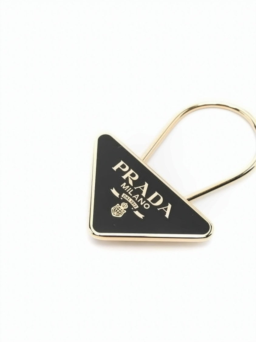 Prada Triangular Metal Keyring With Black Enamel And Gold Accents