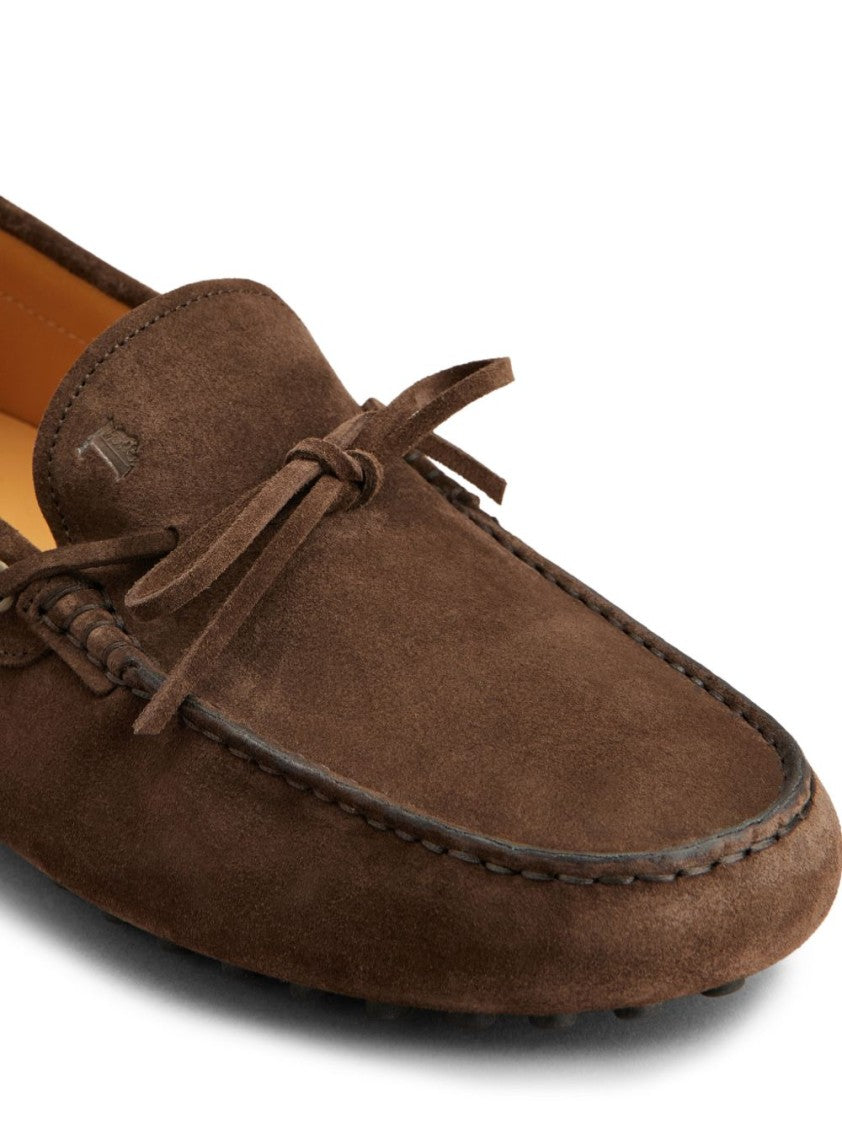 Tod's Moccasin Toe Loafers With Decorative Bow And Rubber Pebble Sole