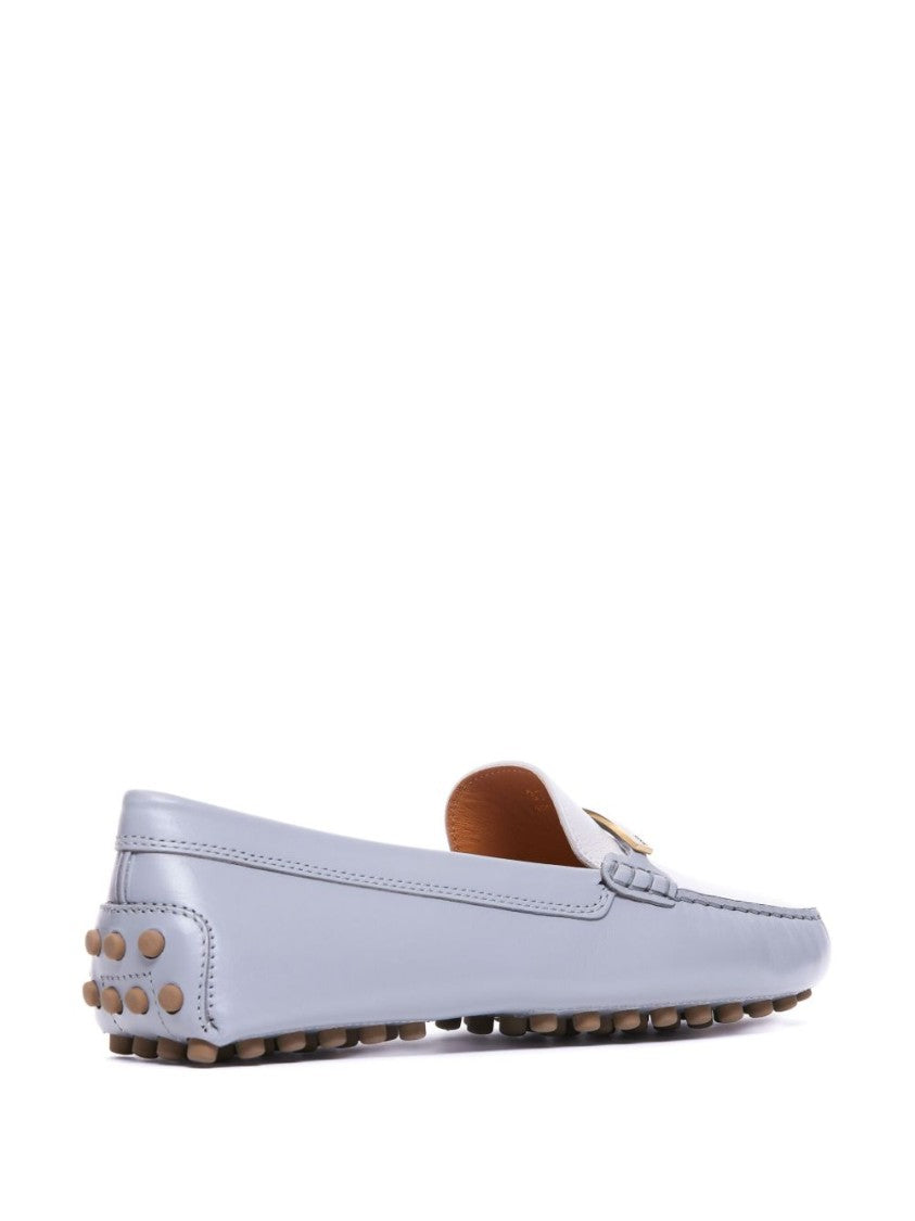 Tod's Classic White Moccasin Flat Shoes With Rubber Studded Sole