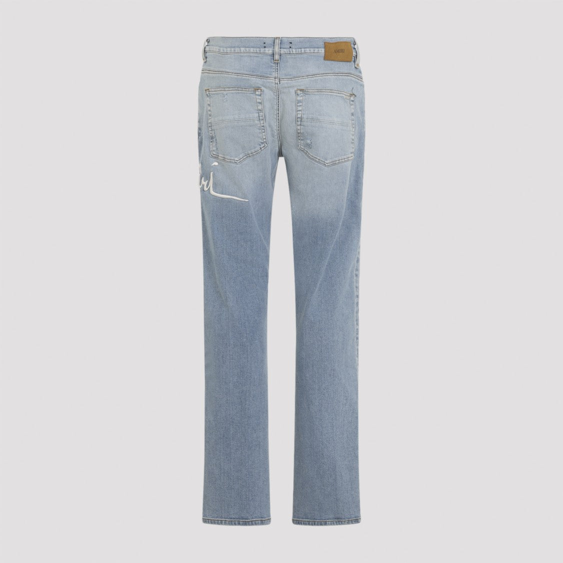 Amiri Distressed Light Blue Jeans With Modern Fit
