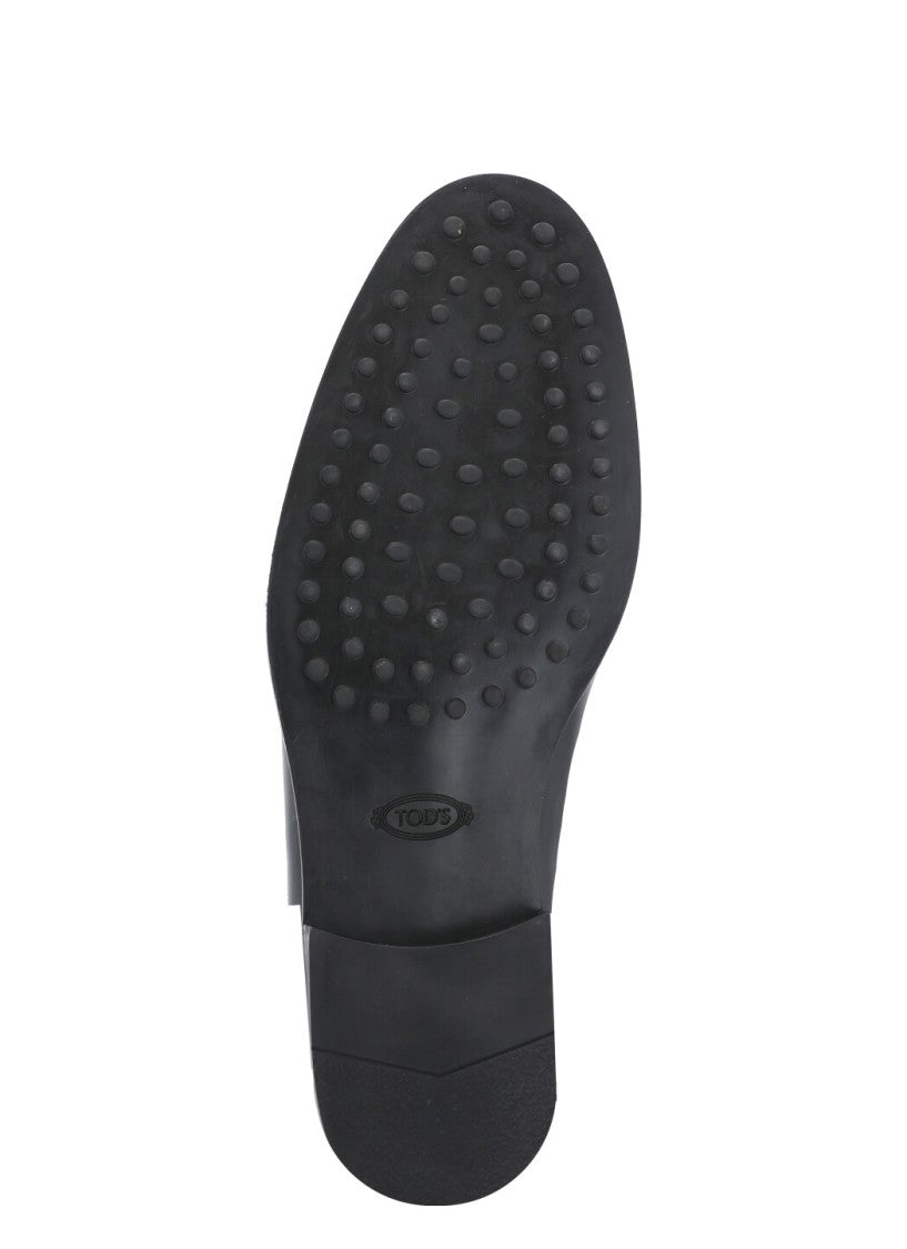 Tod's Black Embossed Monogram Loafers