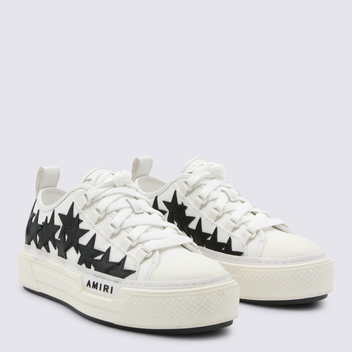 Amiri Chunky Sole Sneakers With Bold Star Appliqués