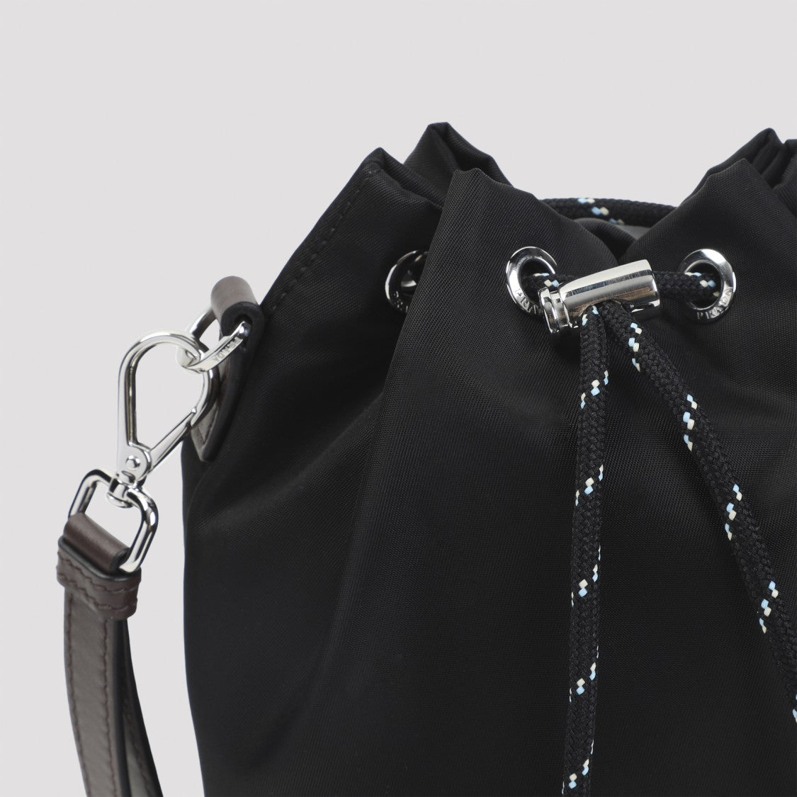 Prada Cylindrical Black Polyamide Clutch With Drawstring Closure
