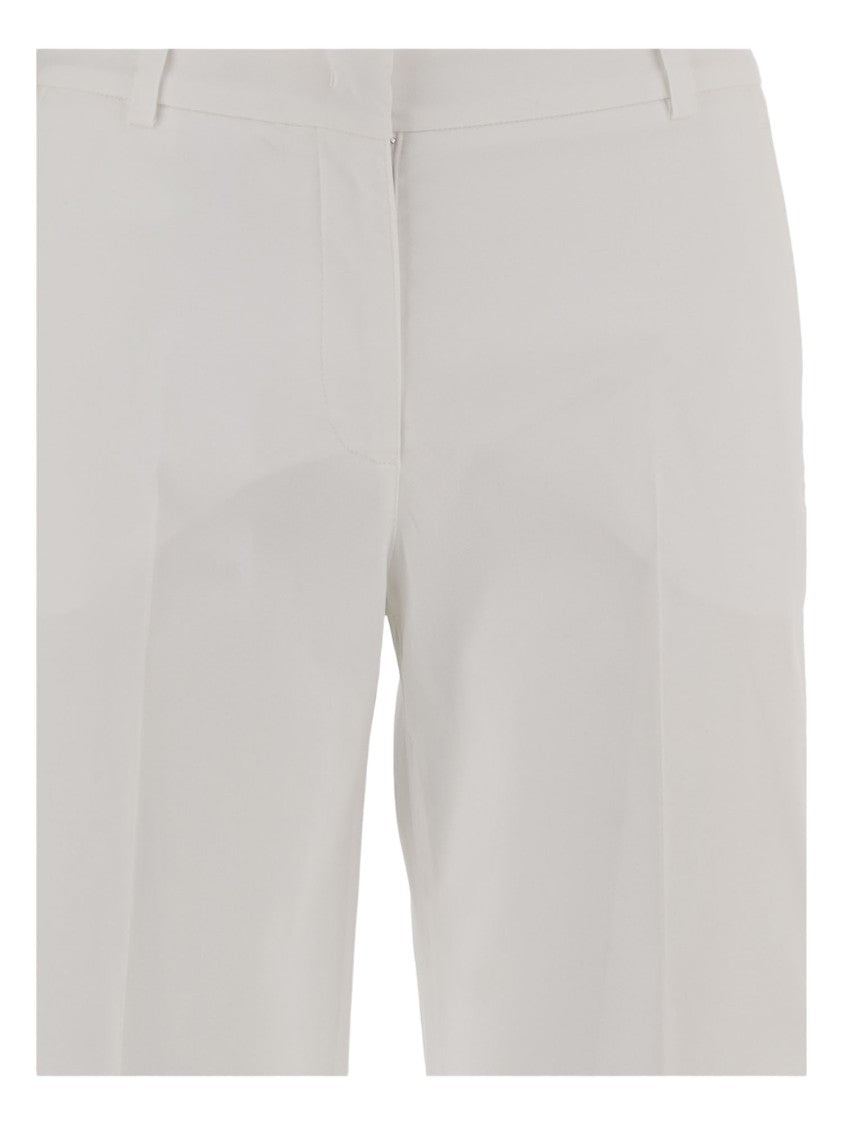 Ql2 Flared Stretch Cotton Pants With Pressed Crease