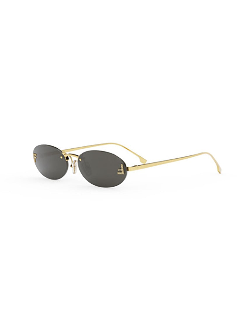 Fendi Oval Metal Sunglasses With Gold Finish And Slim Temples