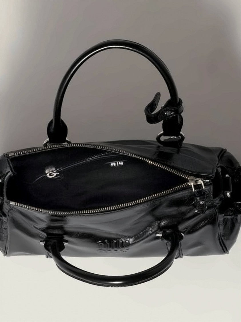 Miu Miu Elongated Calf Leather Shoulder Bag With Accented Drawstring Details