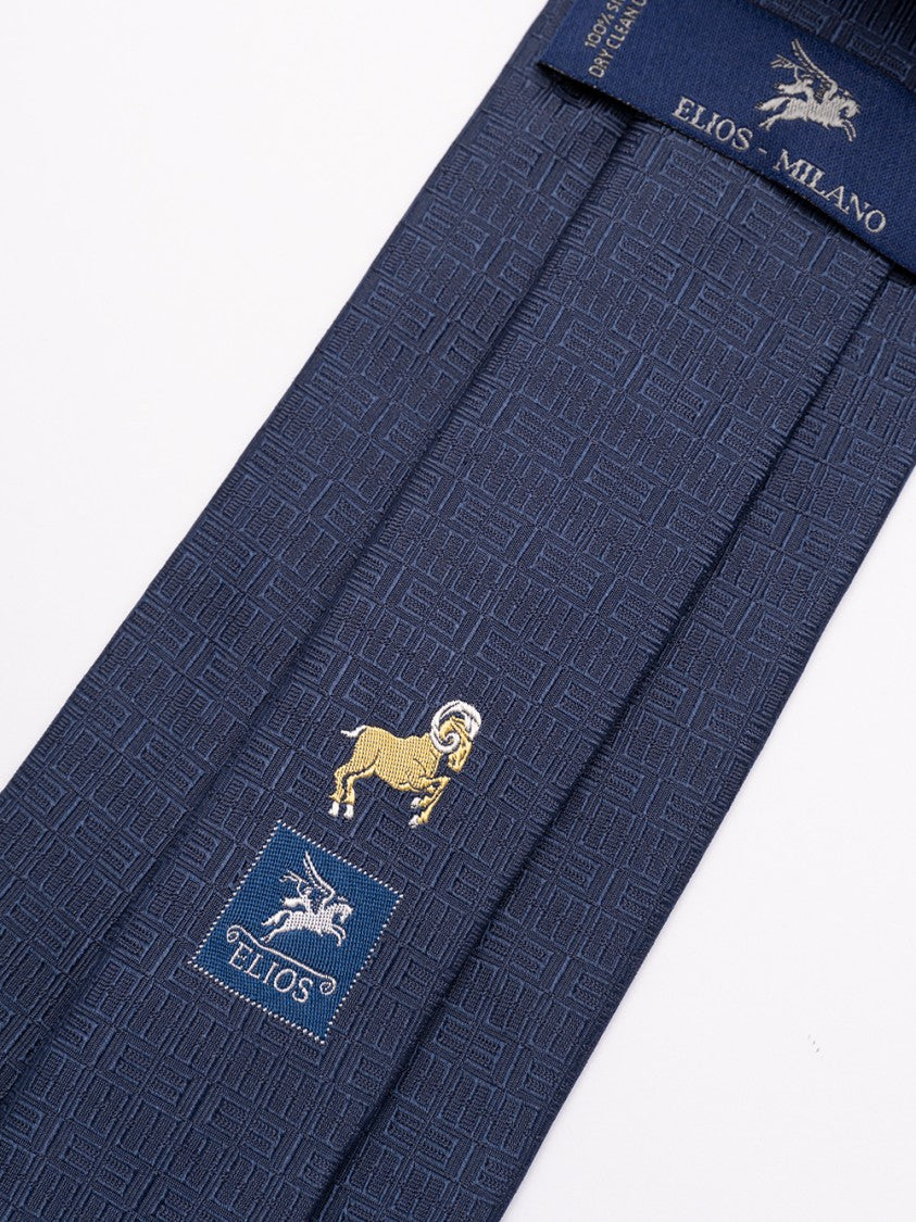 Elios Textured Silk Tie Featuring Zodiac Sign Emblem