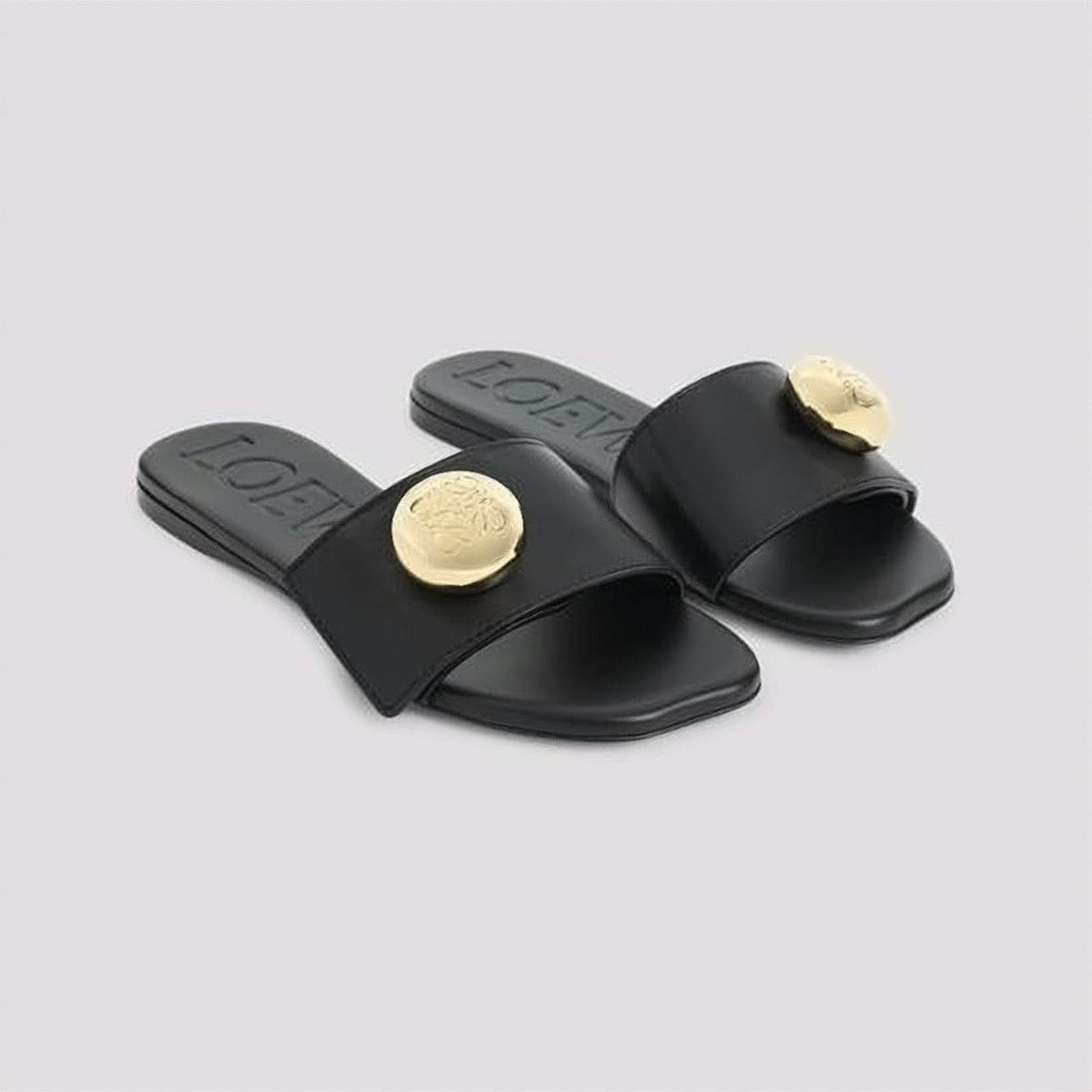 Loewe Minimalist Black Slide Sandals With Gold-Tone Medallion