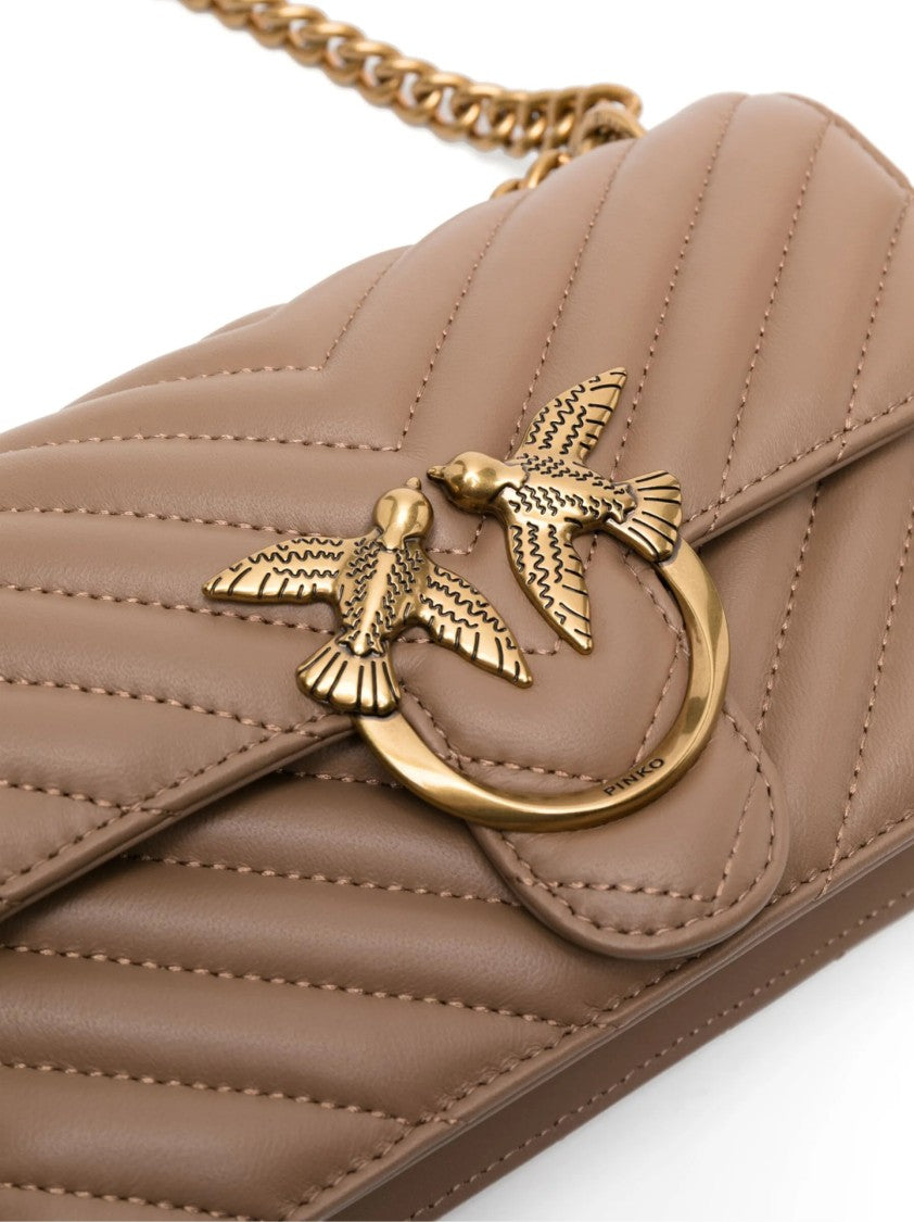 Pinko Chevron Quilted Handbag With Gold Emblem And Versatile Chain Strap