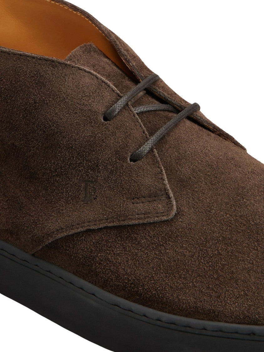 Tod's Smooth Dark Brown Suede Boots With Minimalist Lace-Up Design