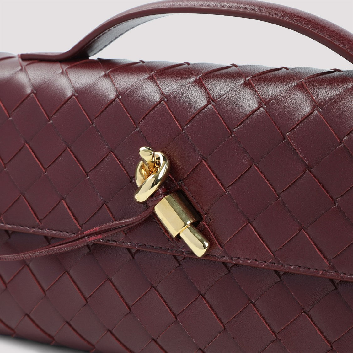 Bottega Veneta Fondant Intreccio Leather Clutch With Knot Closure
