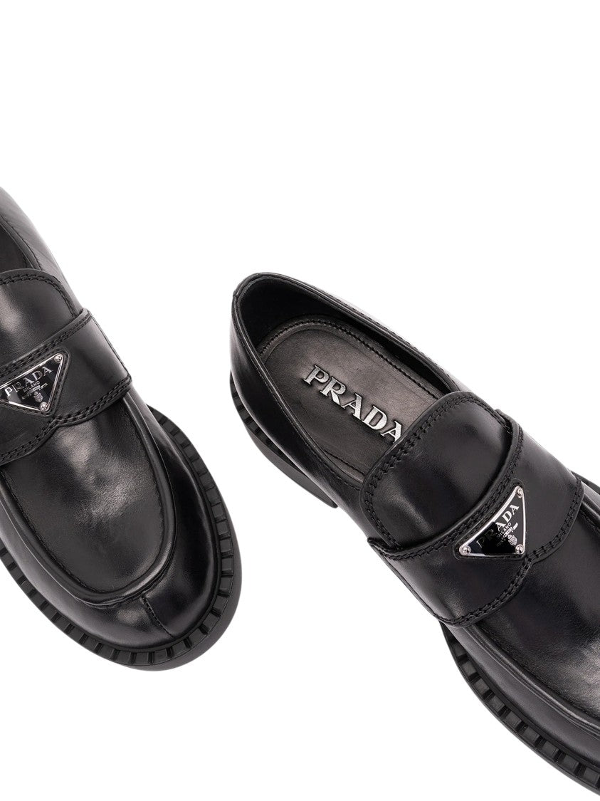 Prada Enamelled Triangle Logo Black Leather Slip-On Shoes