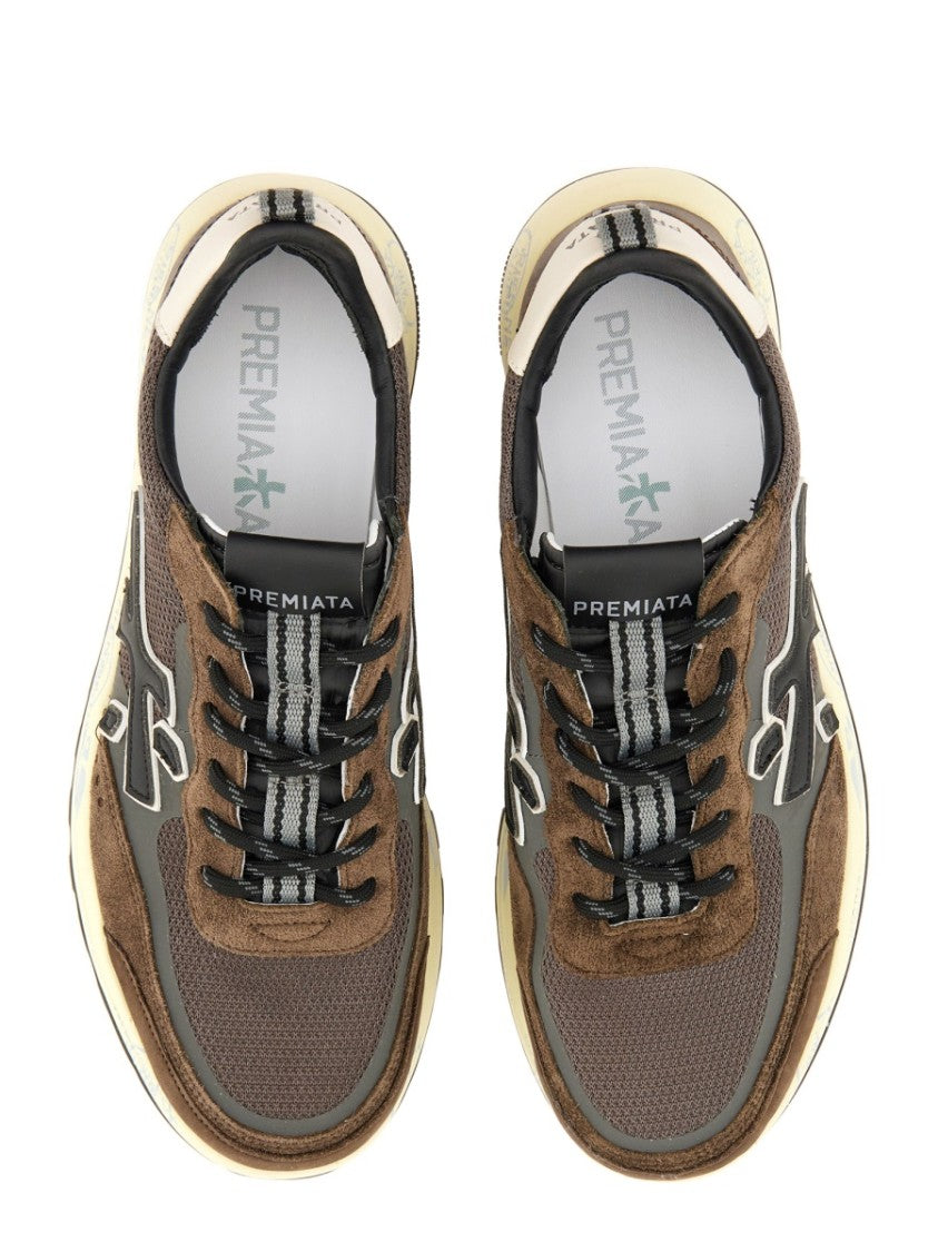 Premiata Layered Brown Sneakers With Textured Accents And Cream Sole
