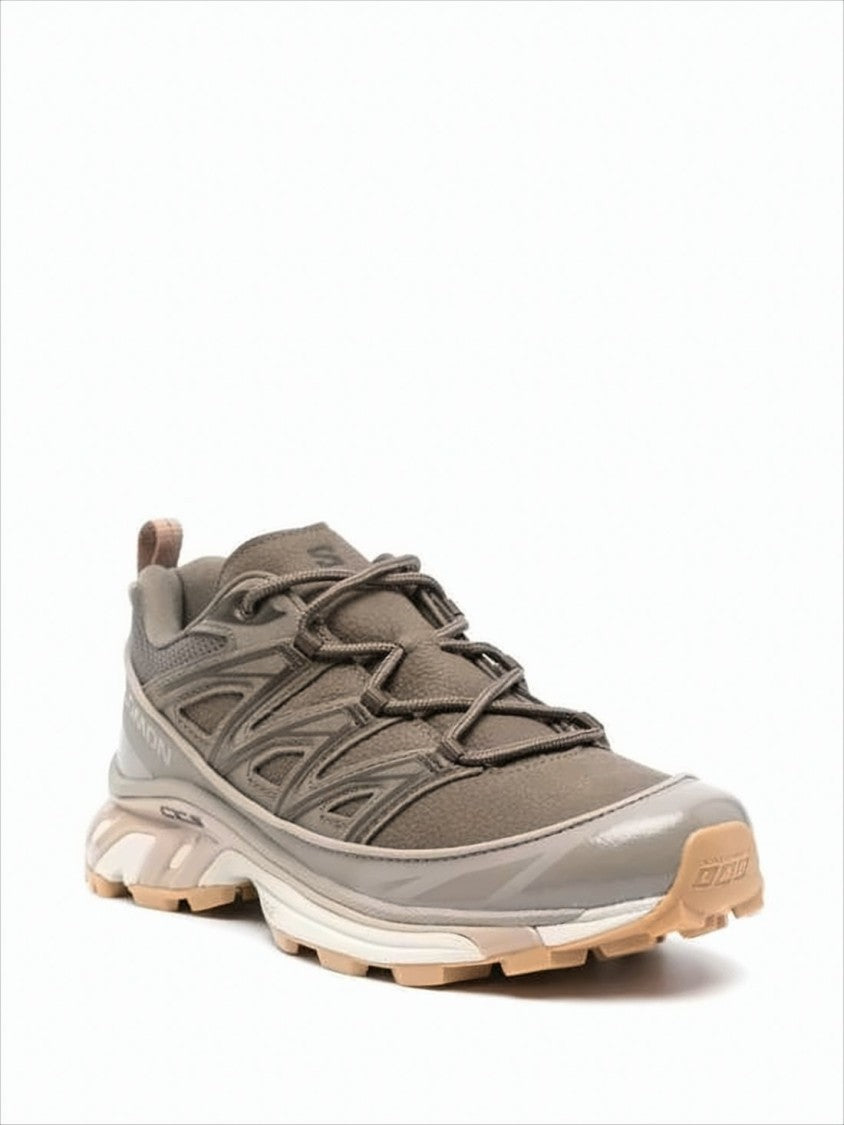 Salomon Streamlined Multitexture Sneakers With Supportive Cage Overlay