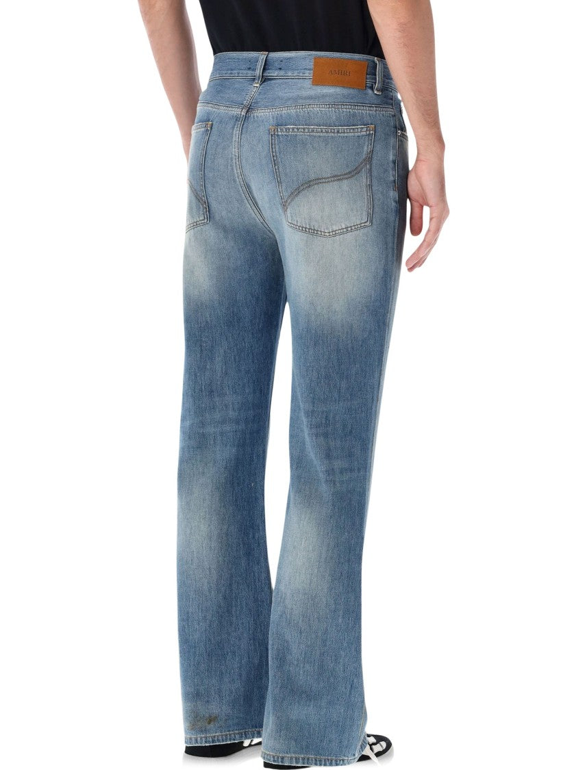 Amiri Slash Aged Wash Cut-Knee Distressed Bootcut Jeans
