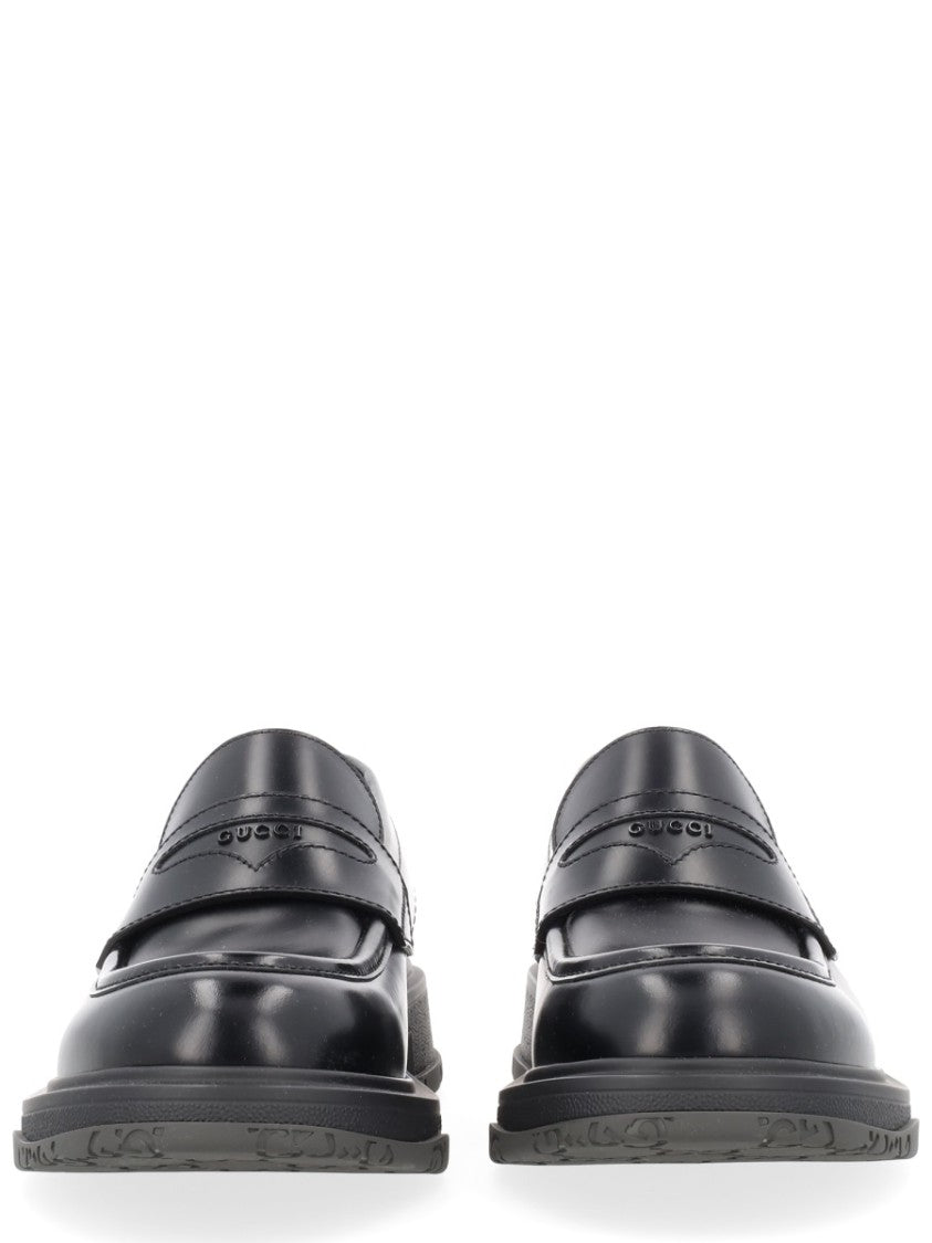 Gucci Black Leather Penny Loafers