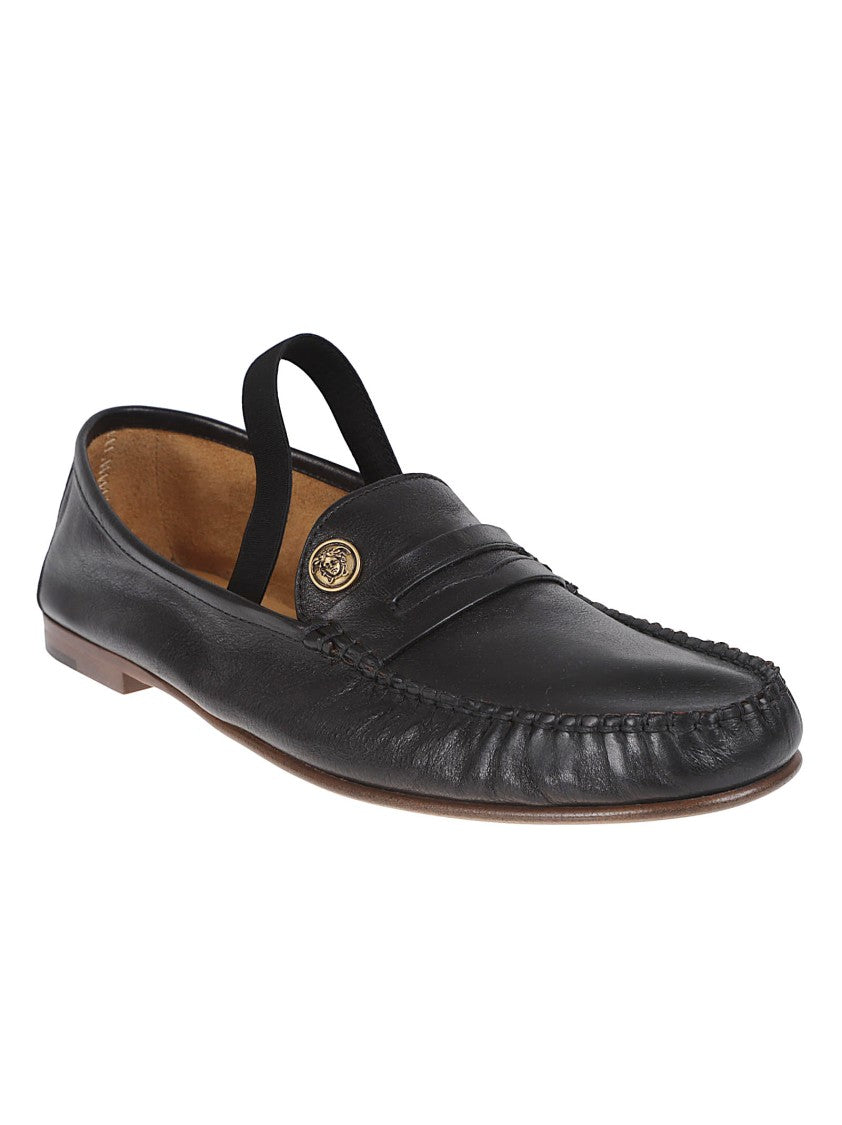 Versace Flat Black Moccasins With Metallic Detail And Contemporary Silhouette