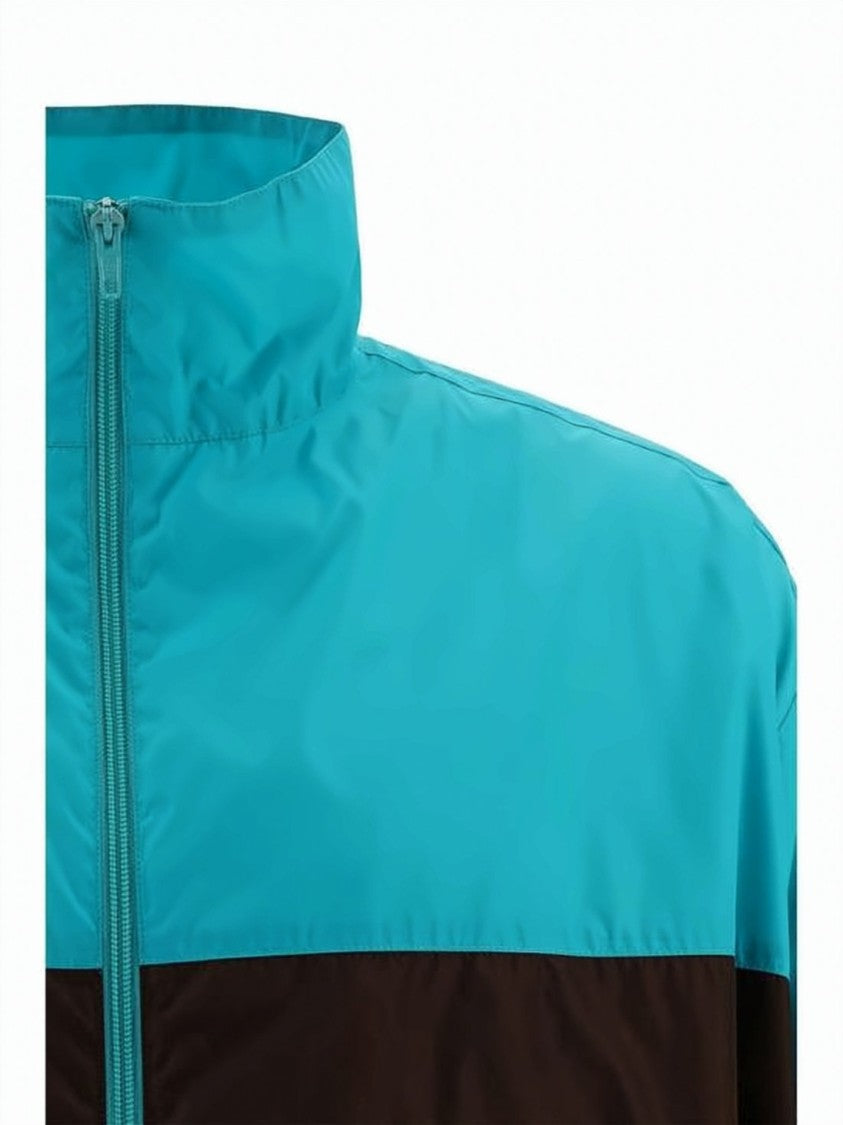 Balenciaga Turquoise Jacket With Bold Black Panel And Striking Lettering