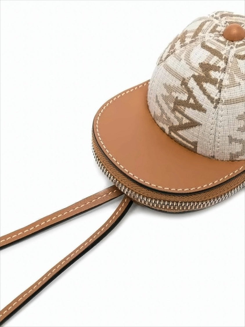 J. W. Anderson Baseball Cap-Inspired Crossbody Bag With Abstract Pattern