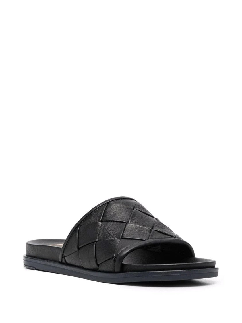 Casadei Minimalist Black Leather Mules With Woven Strap