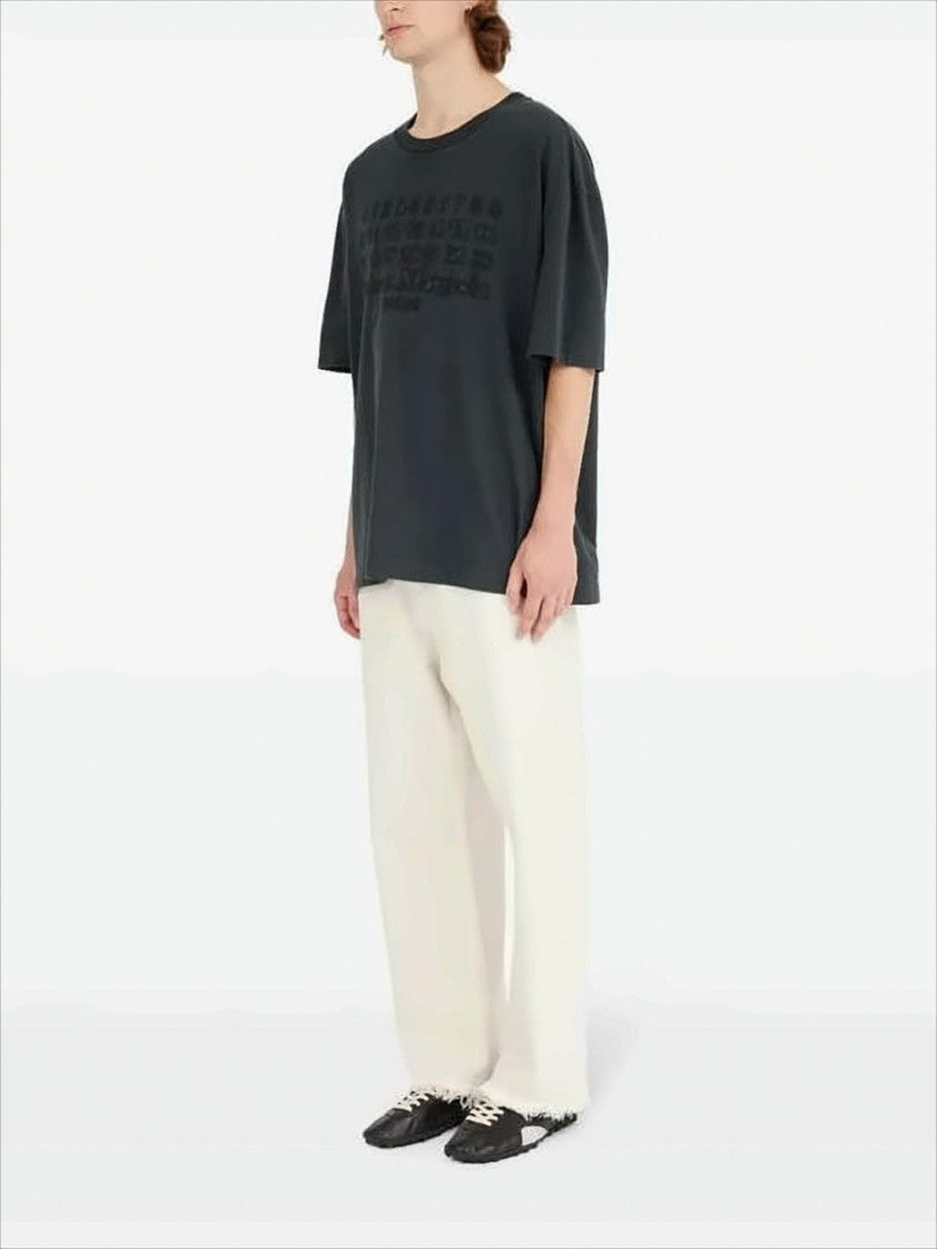 Maison Margiela Minimalist Black Short-Sleeved T-Shirt With Tonal Embossed Design