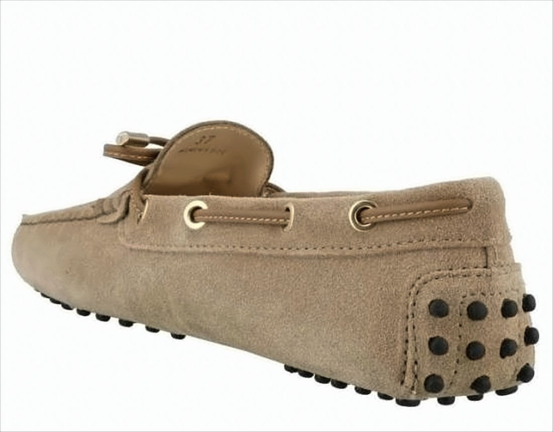 Tod's Classic Suede Loafer With Decorative Bow And Signature Pebbled Sole