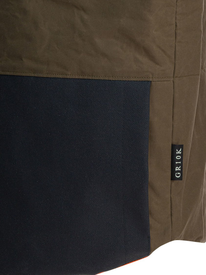Gr10k Padded Color-Blocked Sleeveless Jacket With Modern Fit