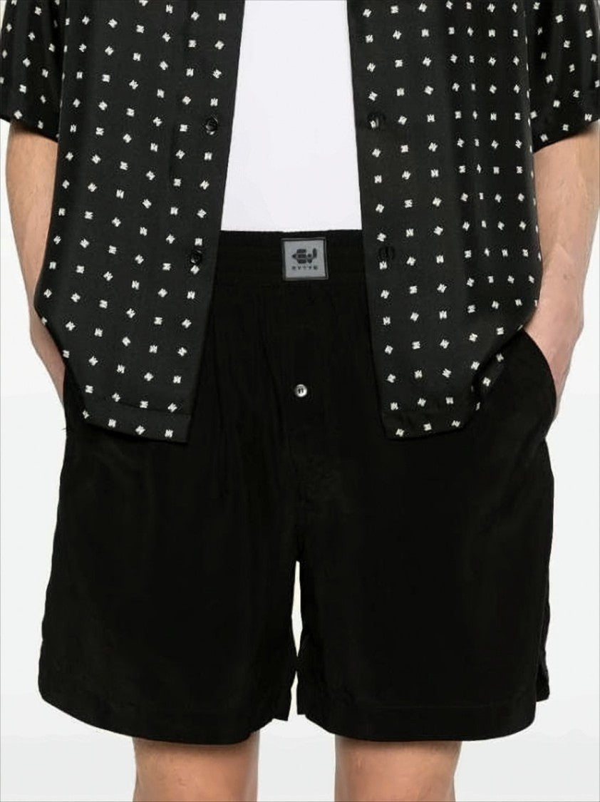 Eytys Mid-Thigh Black Cupro Shorts With Minimalist Design