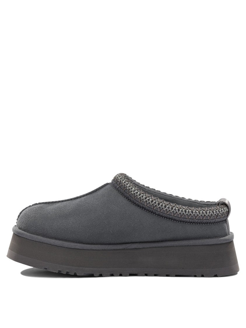 Ugg Black Slip-On Loafers With Braided Trim And Textured Sole