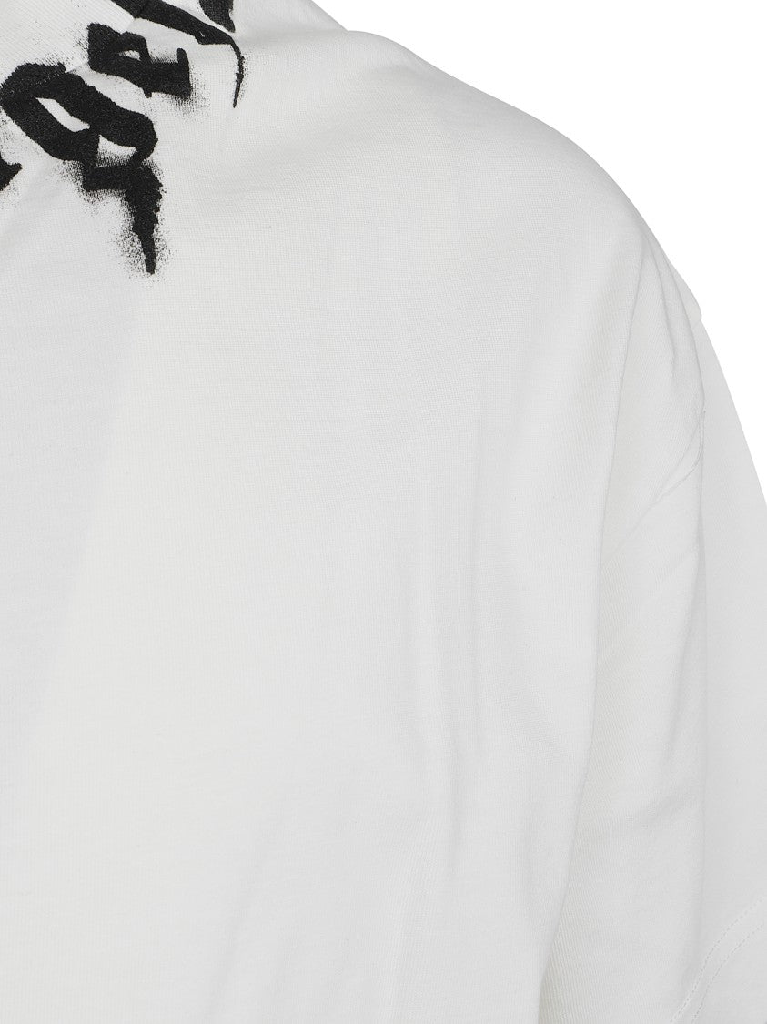 Palm Angels Crew Neck T-Shirt With Spray-Paint Effect Logo Detail