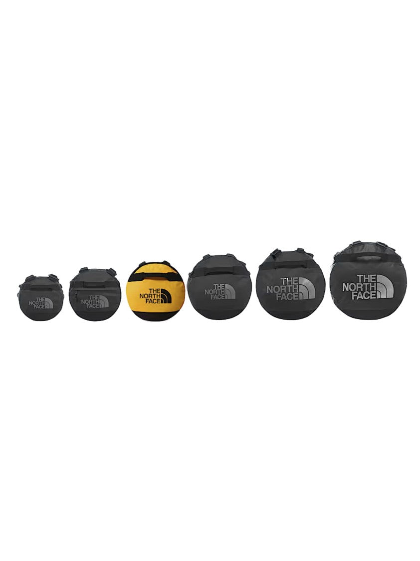 The North Face Cylindrical Yellow Duffel Bag With Black Accents