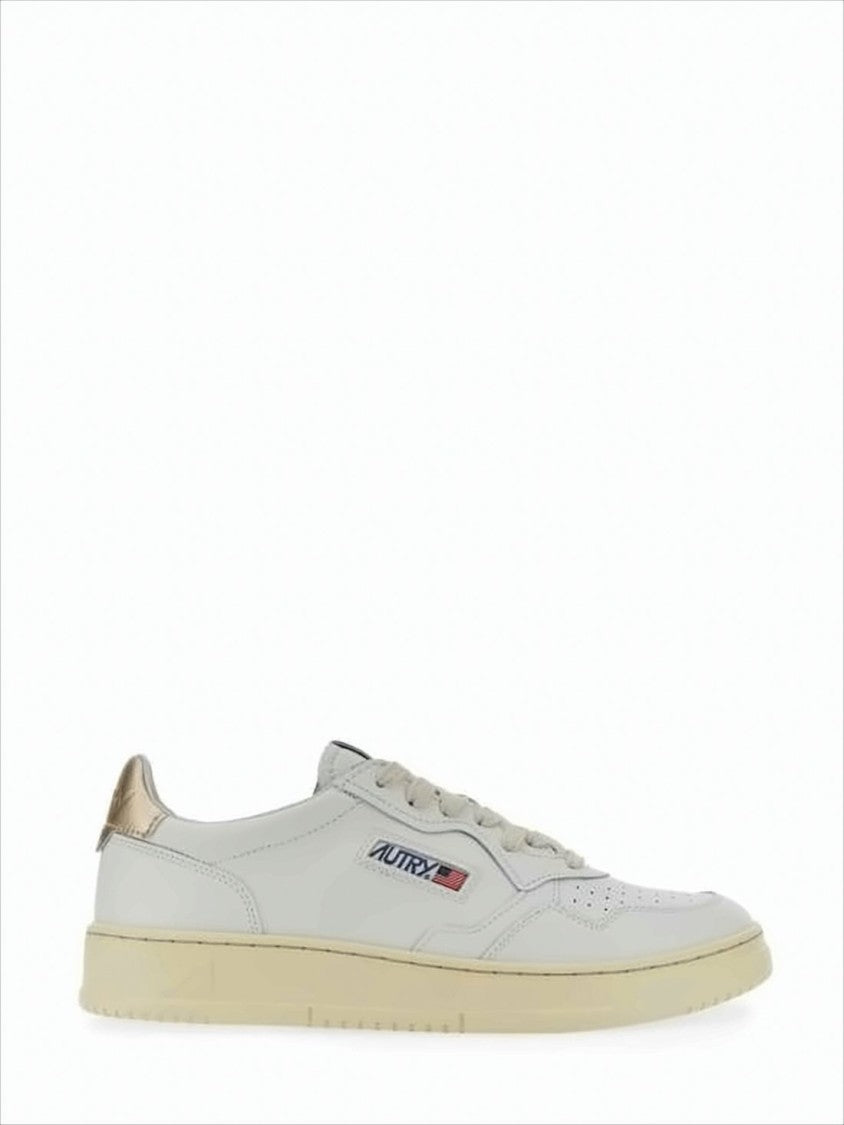 Autry Low-Top White Sneakers With Perforated Detailing And Metallic Accents