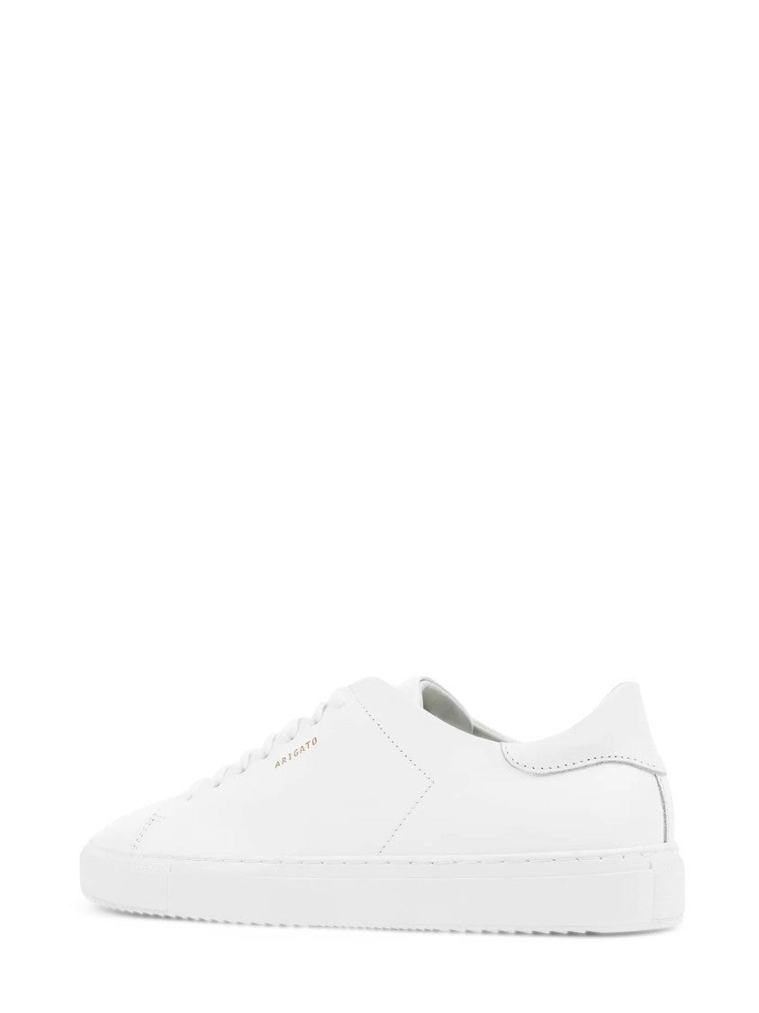Axel Arigato Low-Top White Leather Sneakers With Gold Detailing