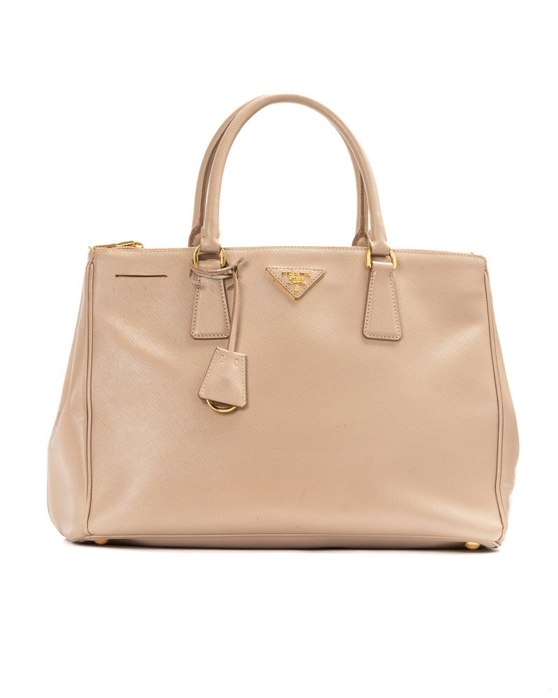 Prada Medium Structured Saffiano Leather Handbag With Gold Accents
