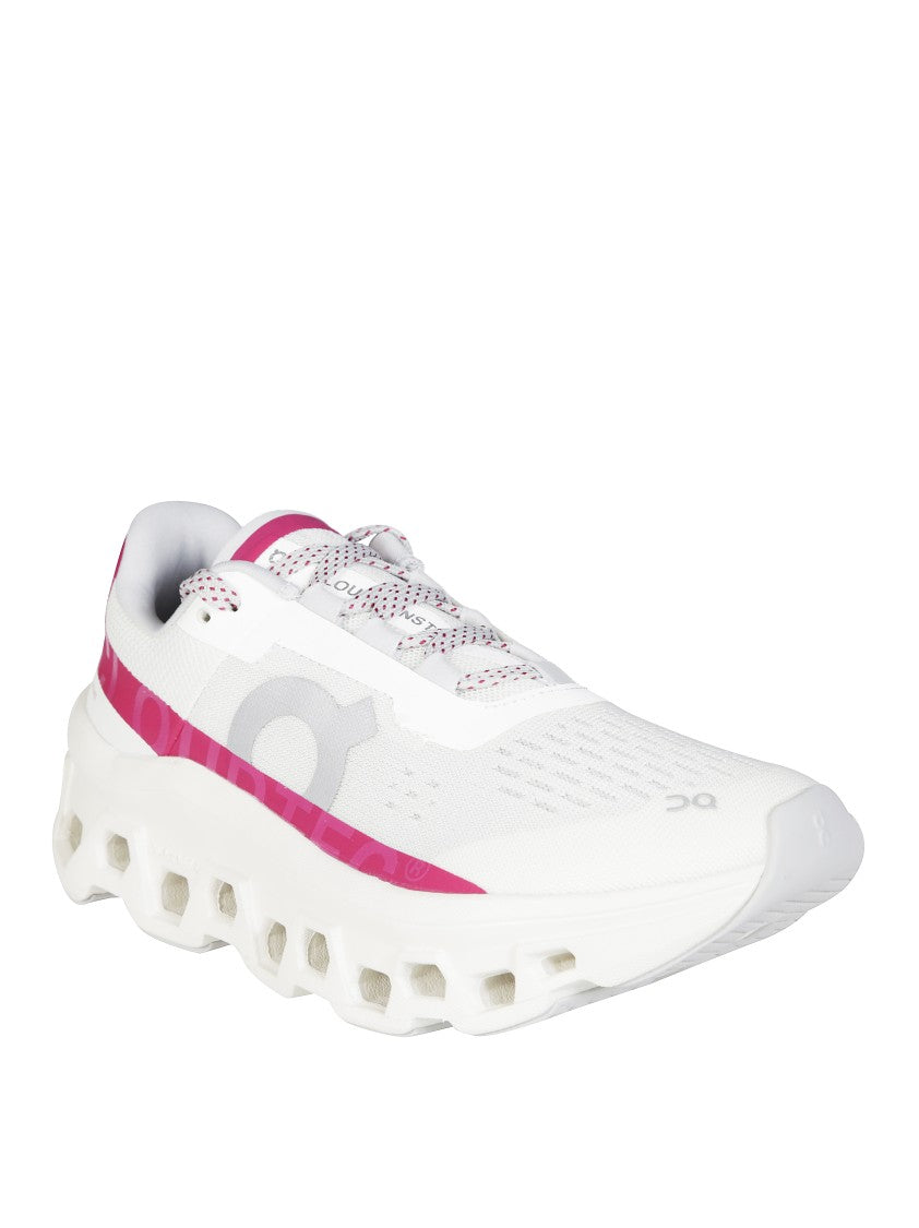 On Running Cloudmonster Sneakers With Sculpted Sole And Bold Accents