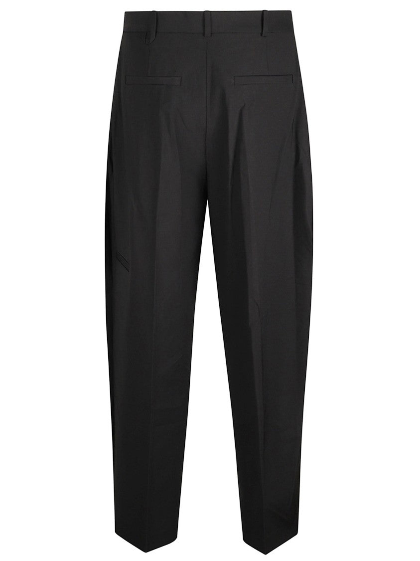 Jacquemus Tapered Leg Trousers With Pleated Design
