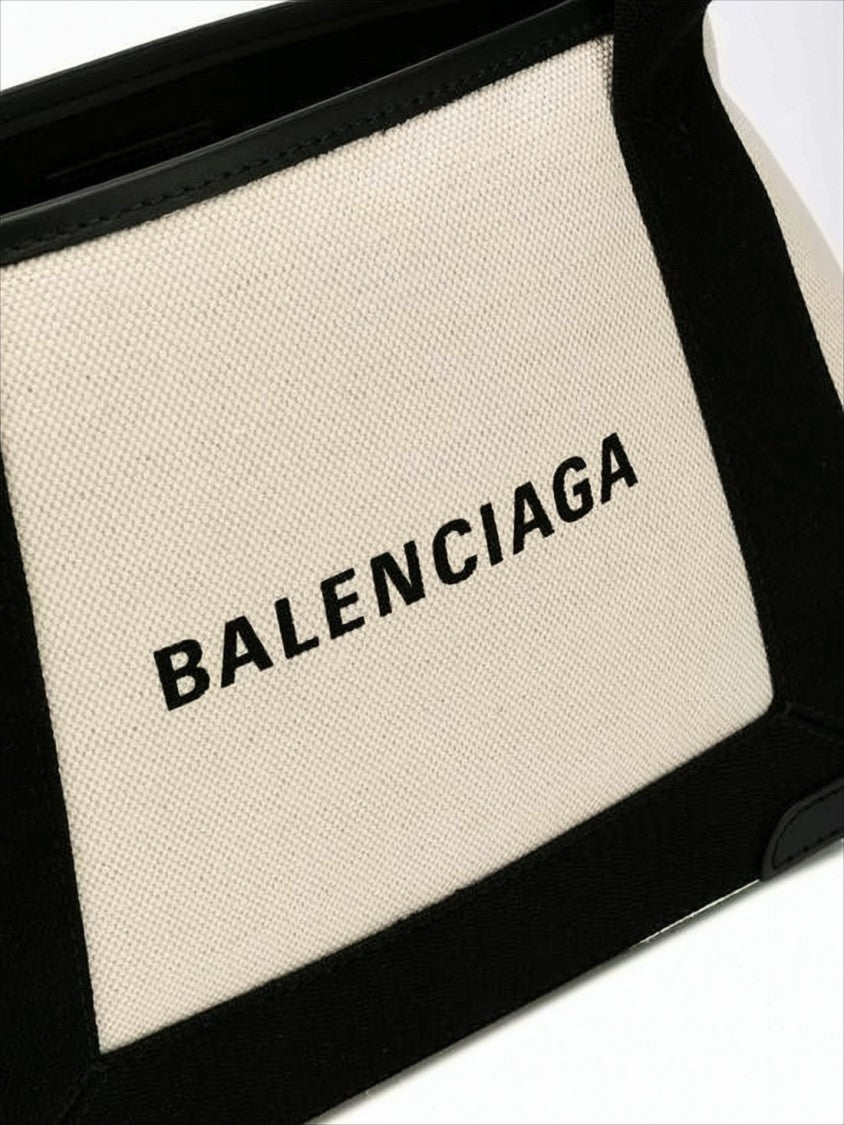 Balenciaga Compact Canvas Tote Bag With Calf Leather Trim And Bold Lettering