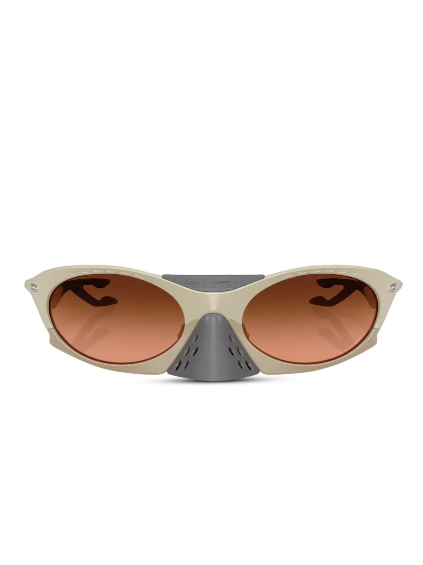 Oakley Beige Frame Brown Tinted Oval Sunglasses