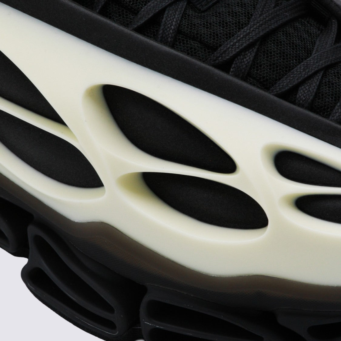 Adidas X Willy Chavarria Futuristic Sneakers With Sculpted Cage Overlay