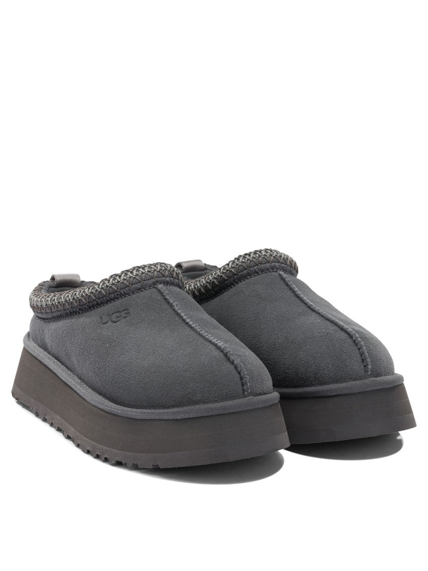 Ugg Black Slip-On Loafers With Braided Trim And Textured Sole