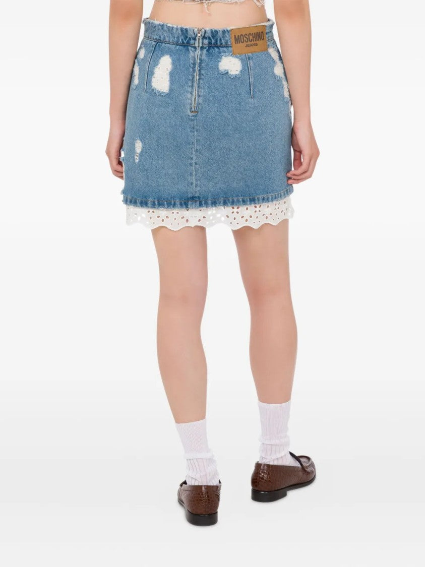 Moschino Distressed Denim Mini Skirt With Lace Trim Detail