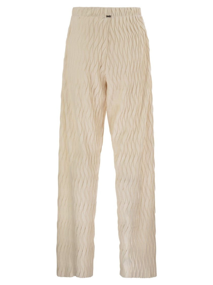 Herno Trousers With Crumpled Effect And Wavy Pattern