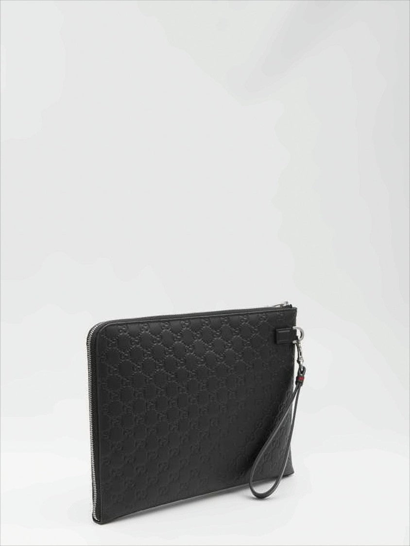Gucci Textured Leather Clutch With Zip Closure