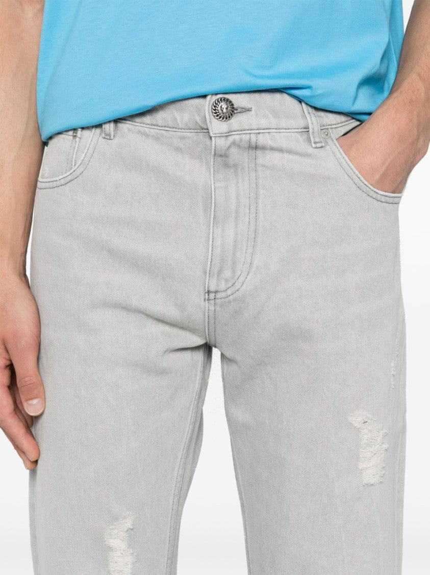 Balmain Light Grey Distressed Denim Trousers