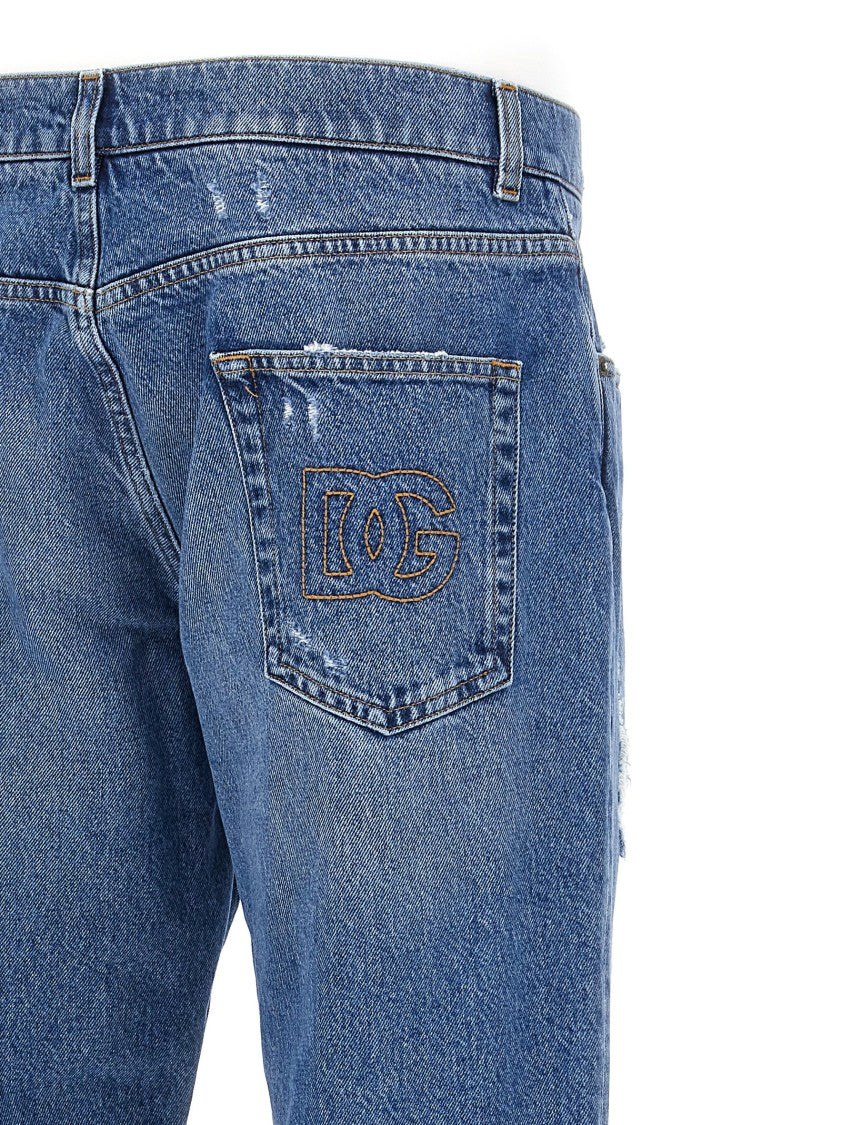 Dolce & Gabbana Distressed Blue Denim Jeans With Logo Embroidery