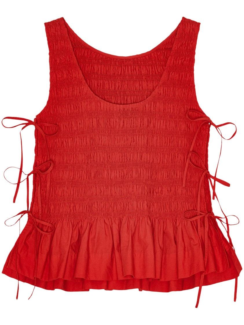 Ganni Smocked Bodice Top With Ruffled Peplum Detail