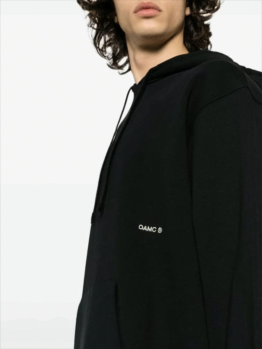 Oamc Relaxed-Fit Black Hoodie With Circular Graphic Design