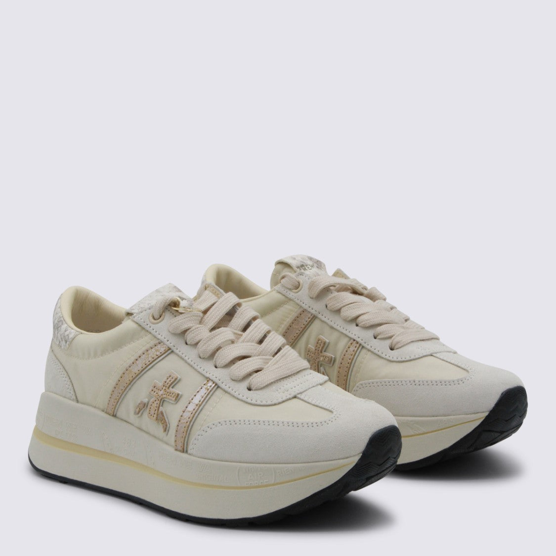 Premiata Off-White Sneakers With Textured Accents And Metallic Charm