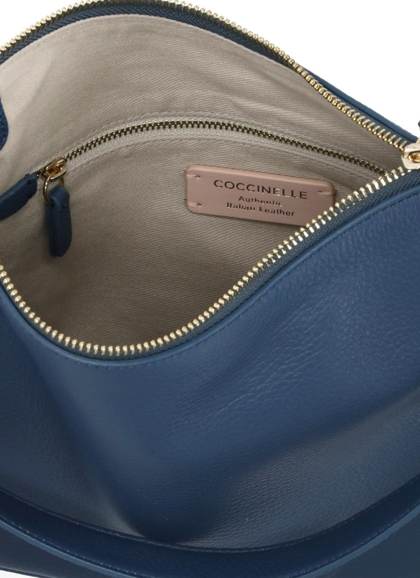 Coccinelle Compact Blue Leather Shoulder Bag With Versatile Strap Options